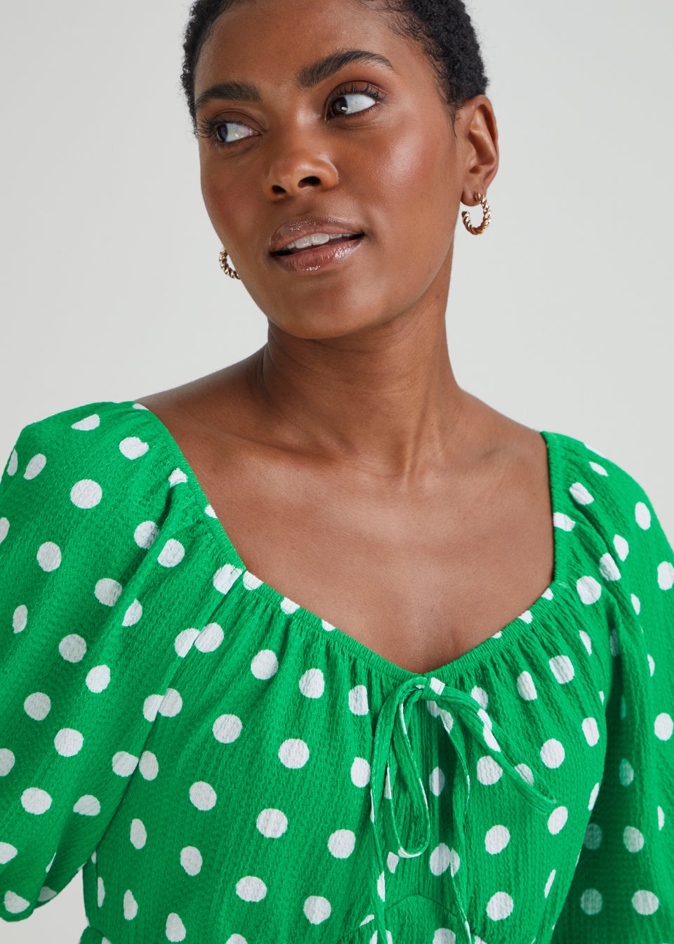 Green spotty dress discount