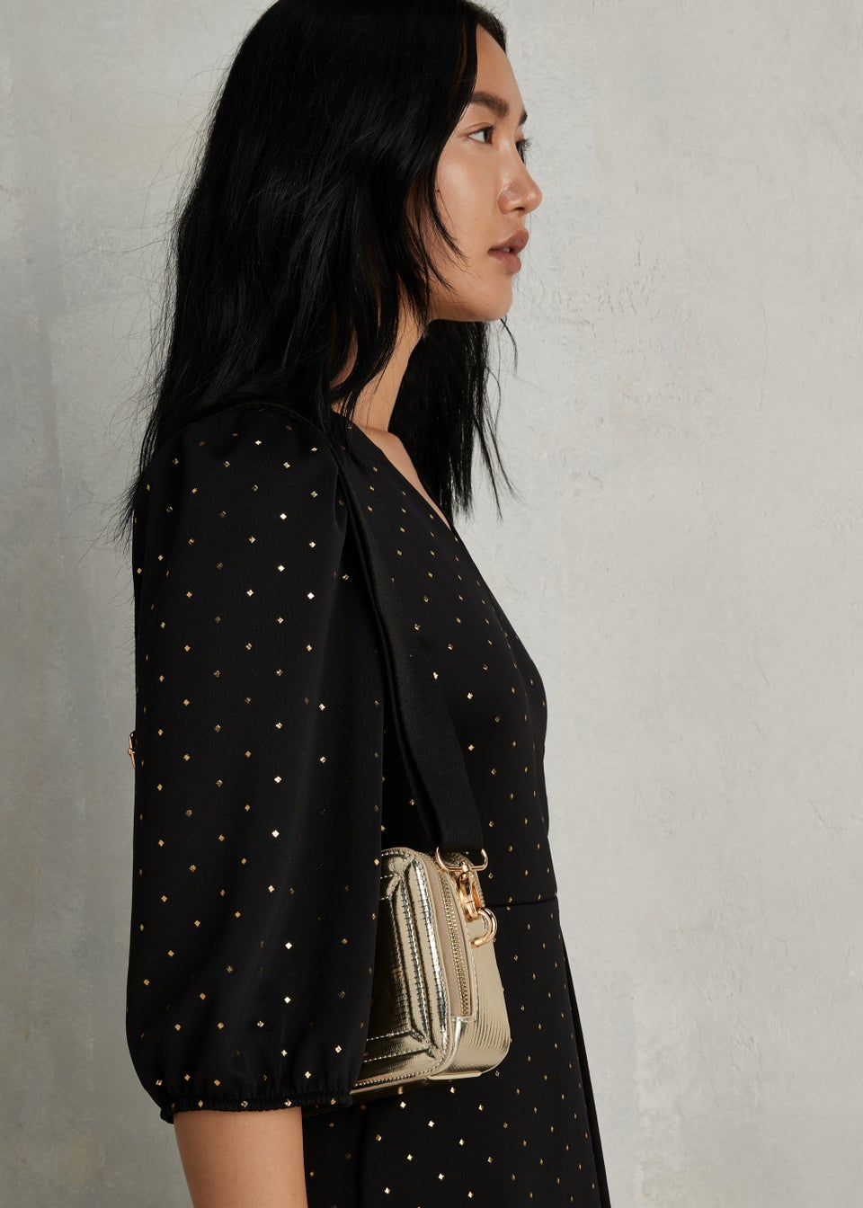 Black dress with gold studs shop