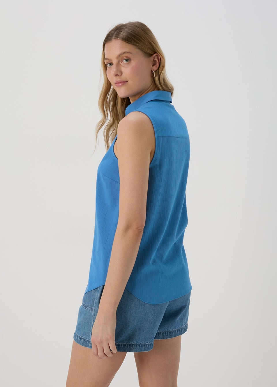 Blue Solid Sleeveless Shirt