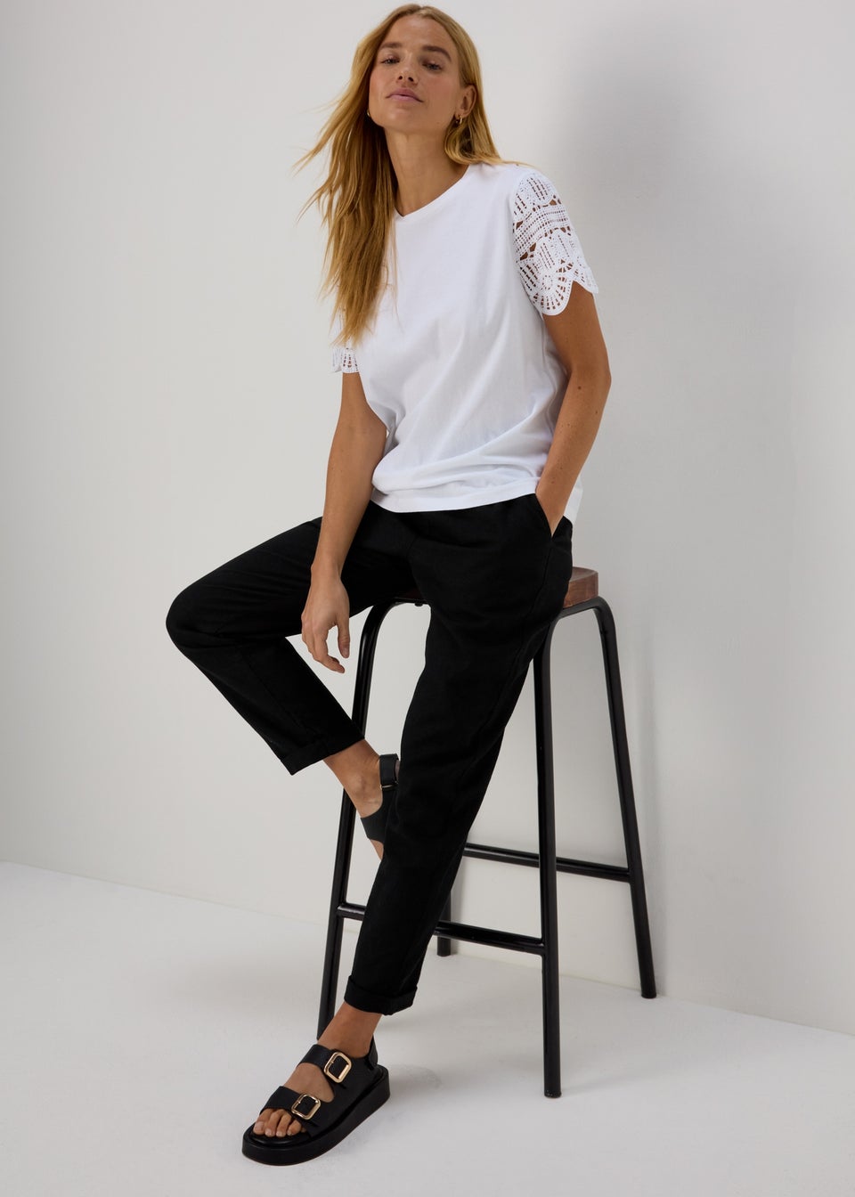 Black tapered linen trousers store