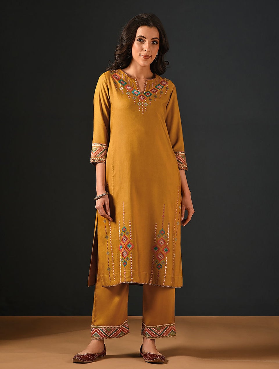 Women Mustard Embroidered Elasticated Waist Modal Palazzo