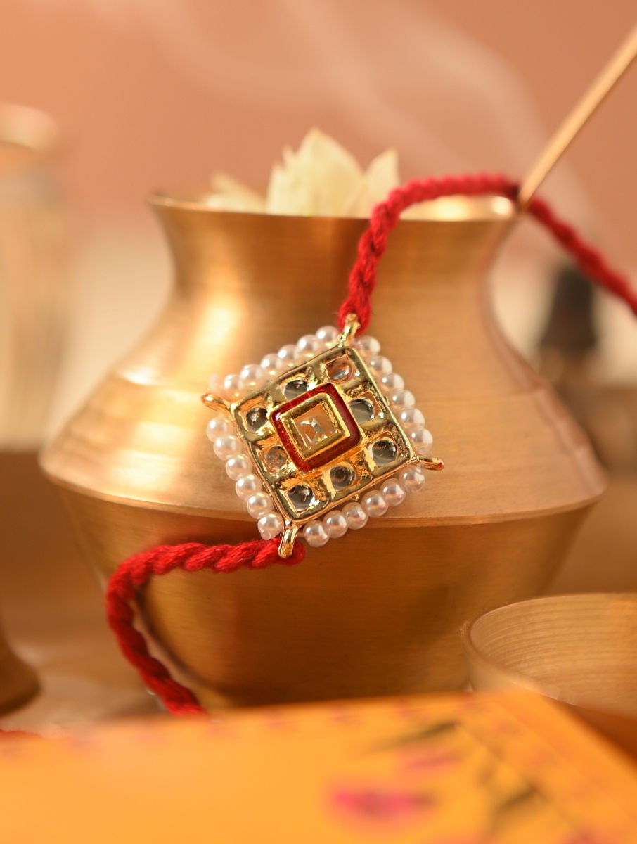 Women Red Gold Tone Kundan Handcrafted Rakhi With Lumba (Set Of 2)