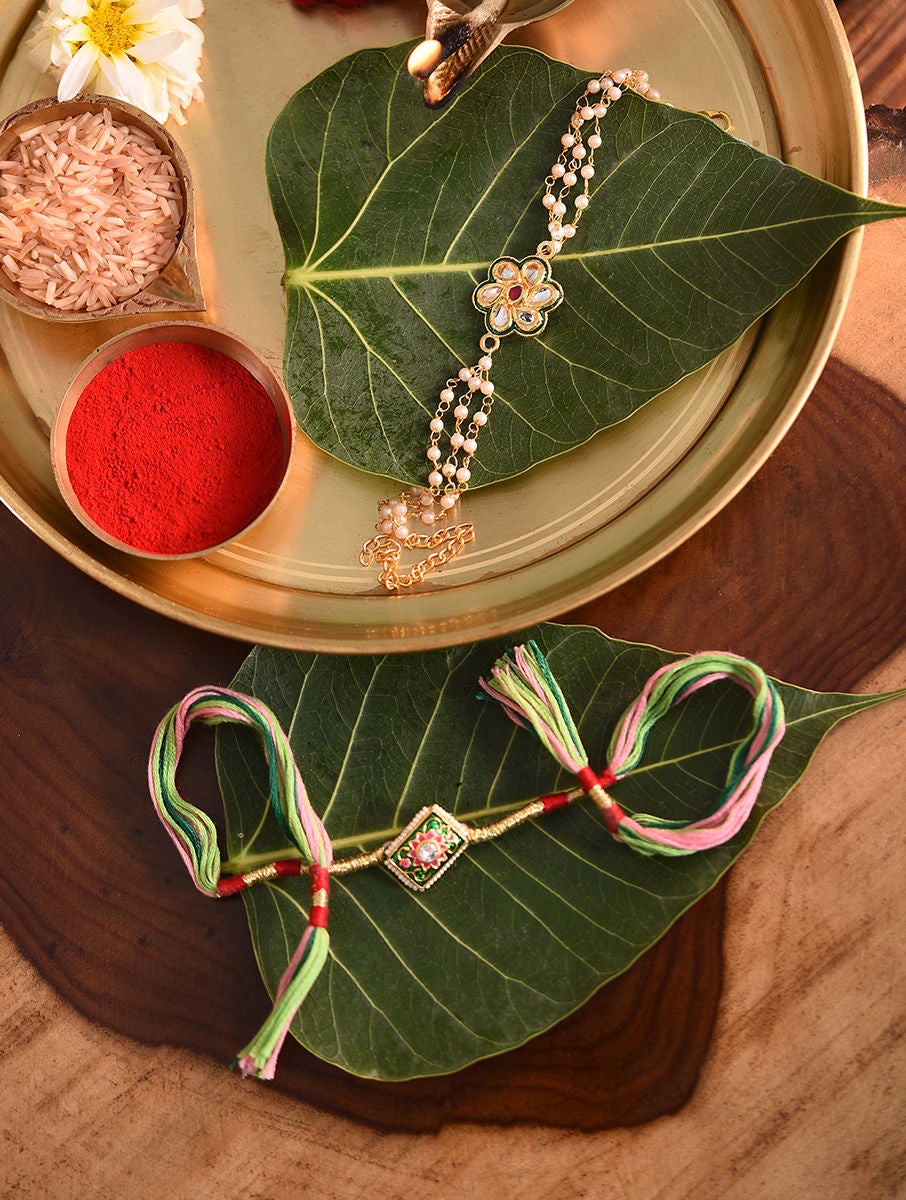 Women Kundan Handcrafted Rakhi With Lumba In A Gift Box (Set Of 2)