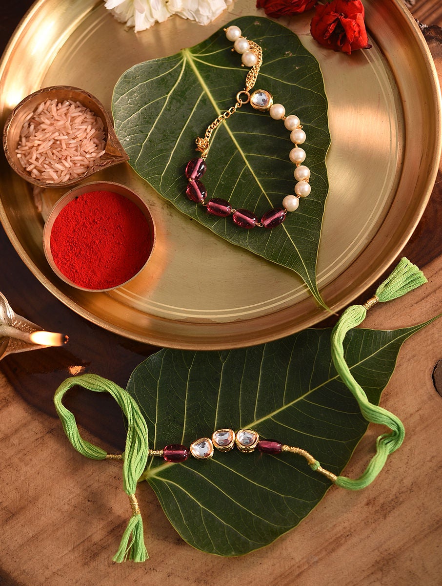 Women Kundan Handcrafted Rakhi With Lumba In A Gift Box (Set Of 2)