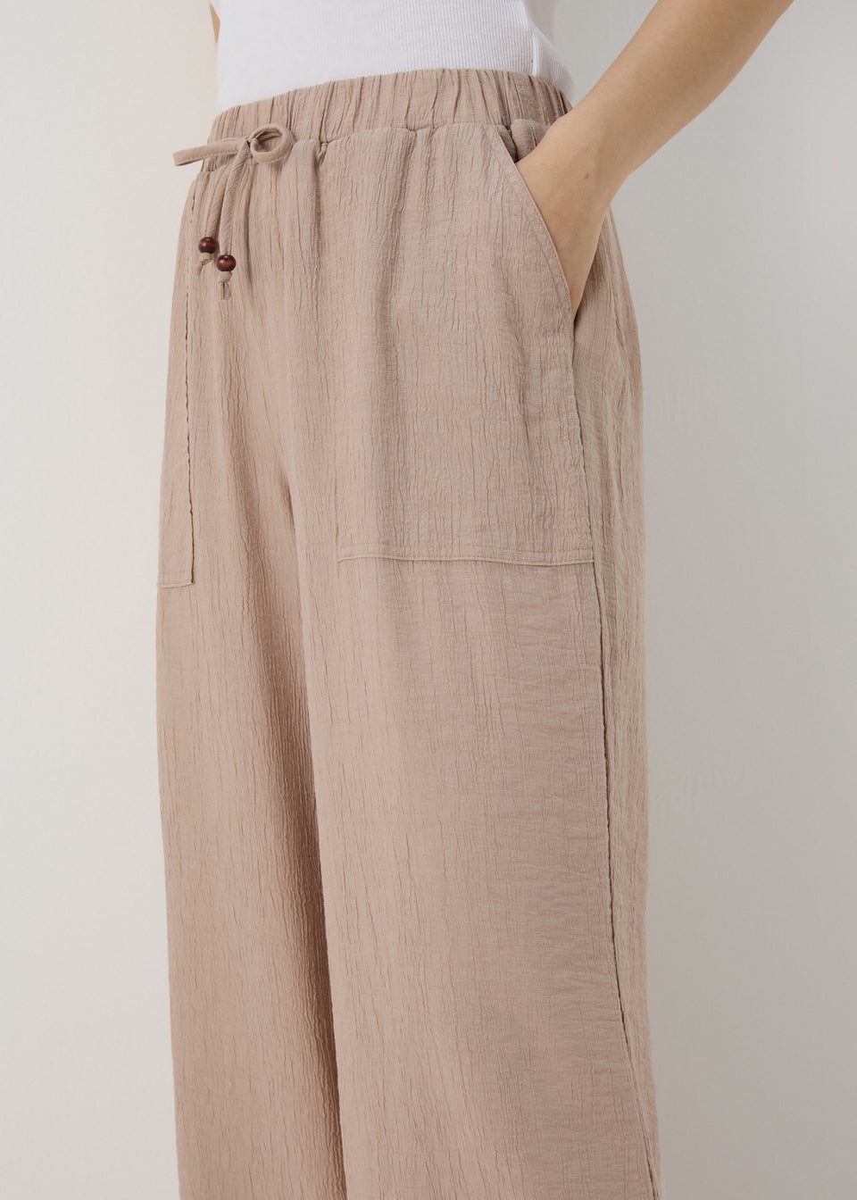 Beige Textured Wide Leg Trousers