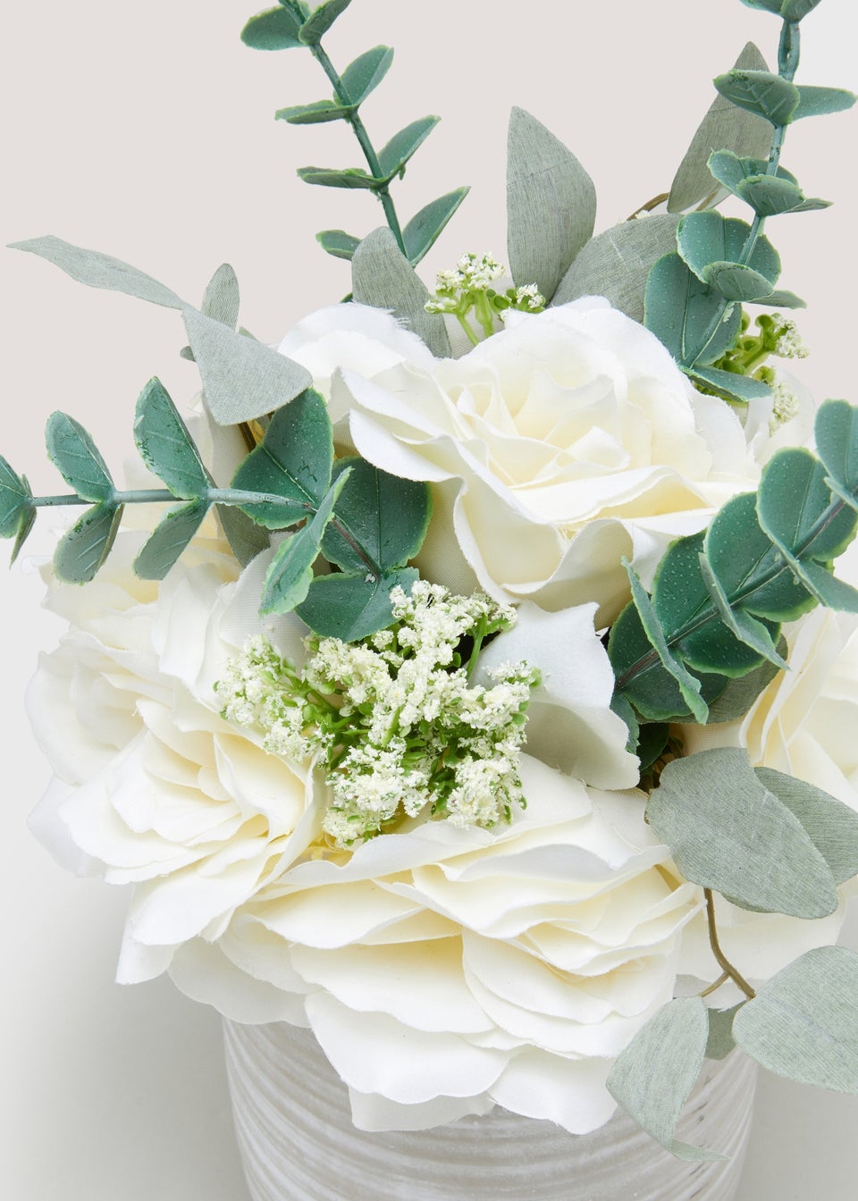 White Roses In Cement Pot
