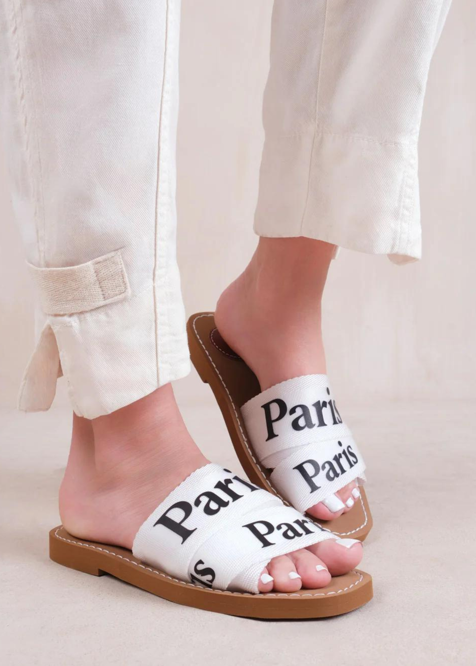 Where's That From White Pu Cobra Flat Sandals