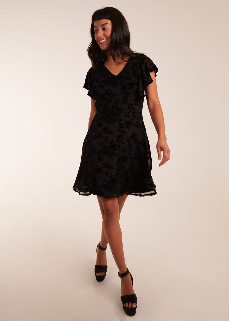 Black dress with blue flowers online