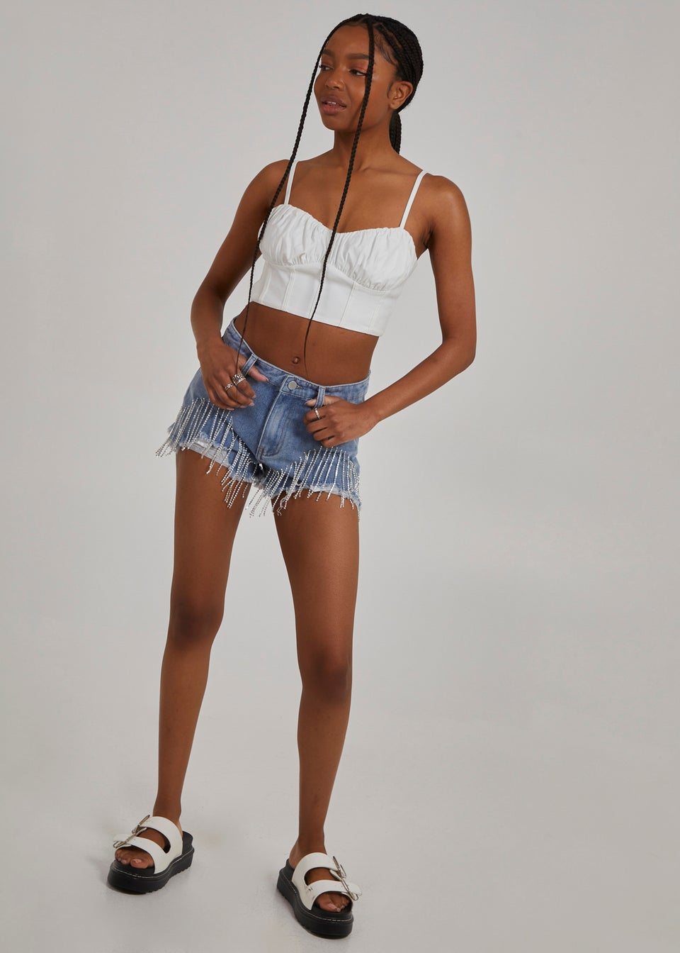 Women in jean shorts store