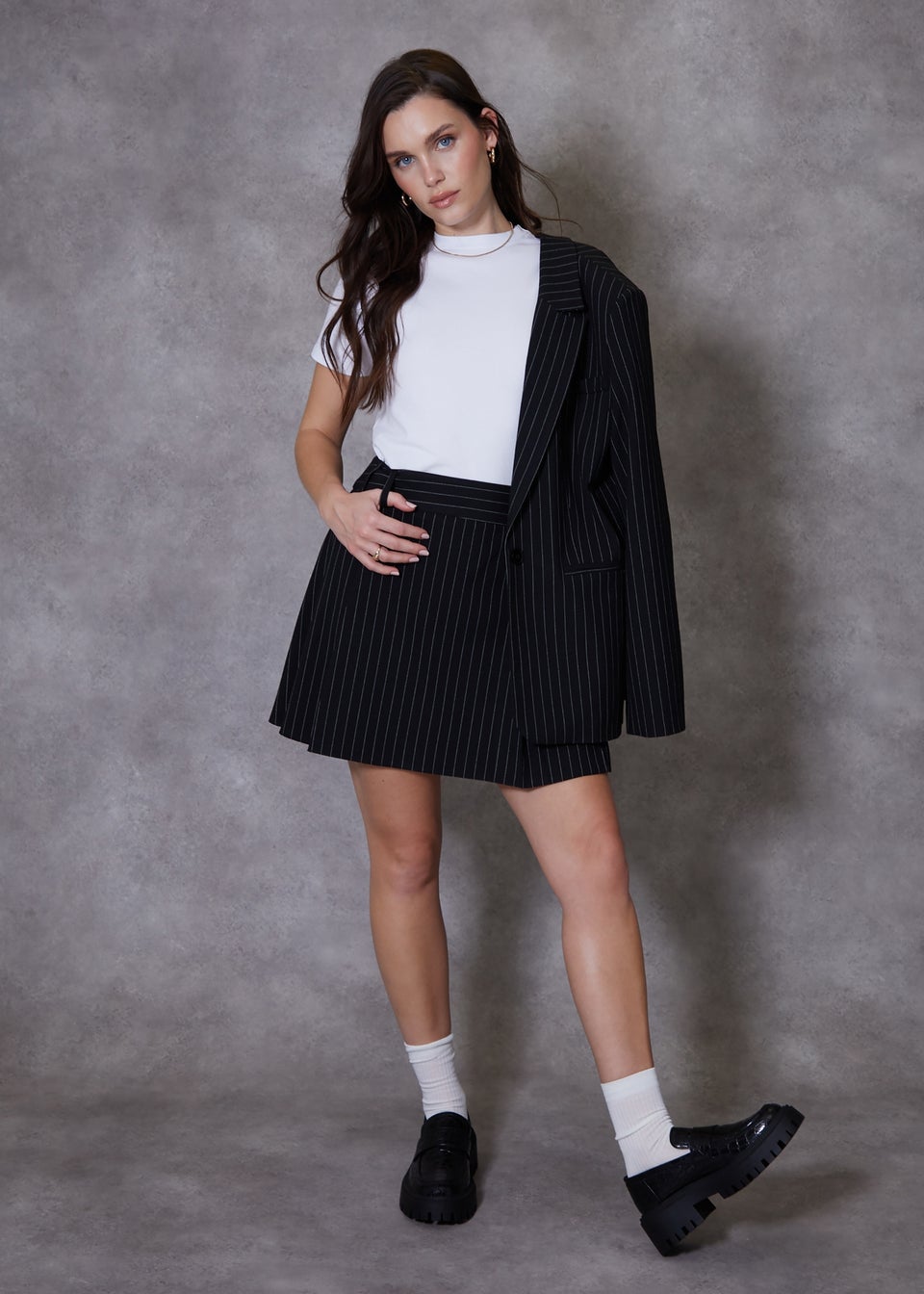 Pleated black and white striped mini skirt best sale