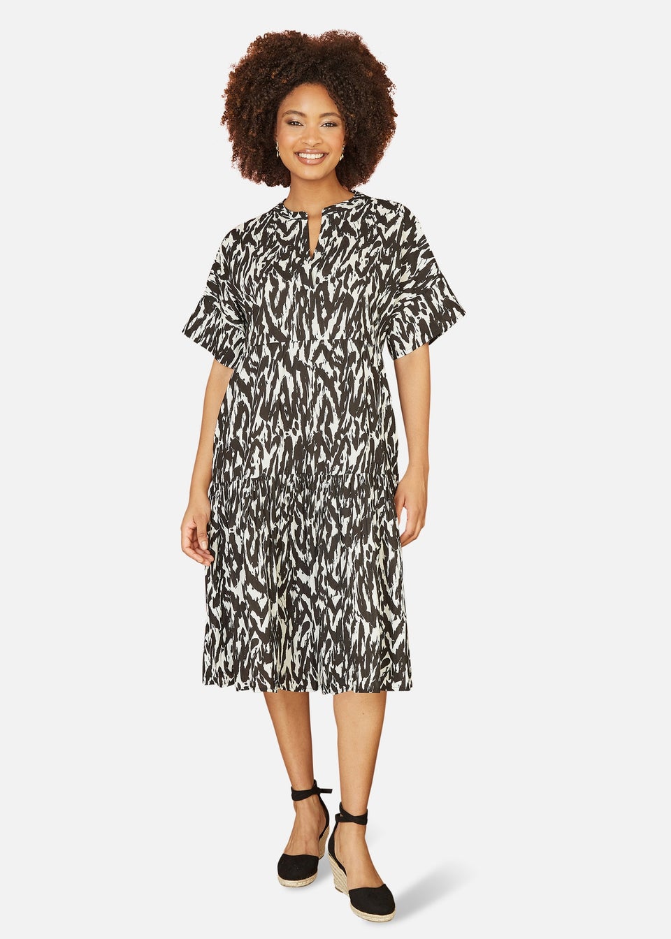 Yumi animal print dress top