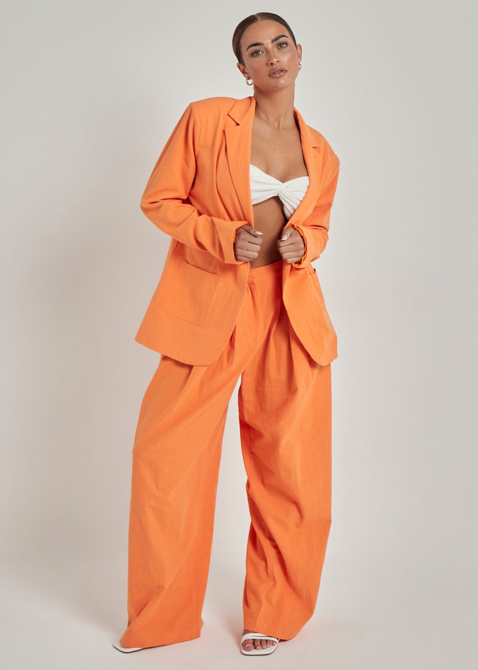 Orange linen trousers on sale