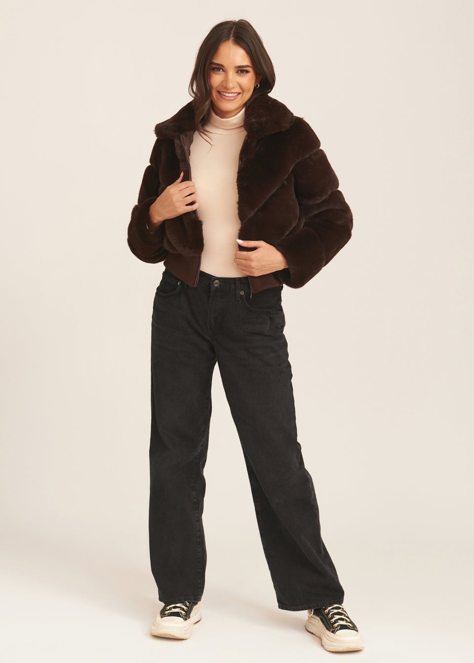 Fur throw over jacket top