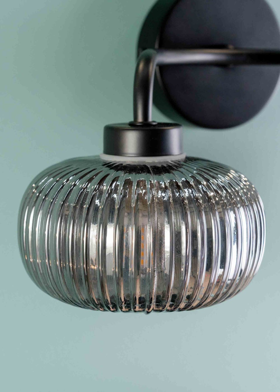 ValueLights Amaia Polished Black Wall Light with Clear Globe Shade
