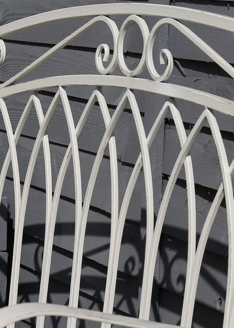 Charles Bentley Wrought Iron Feminine Bench Antique White (H89cm x L104.5cm x W54cm)