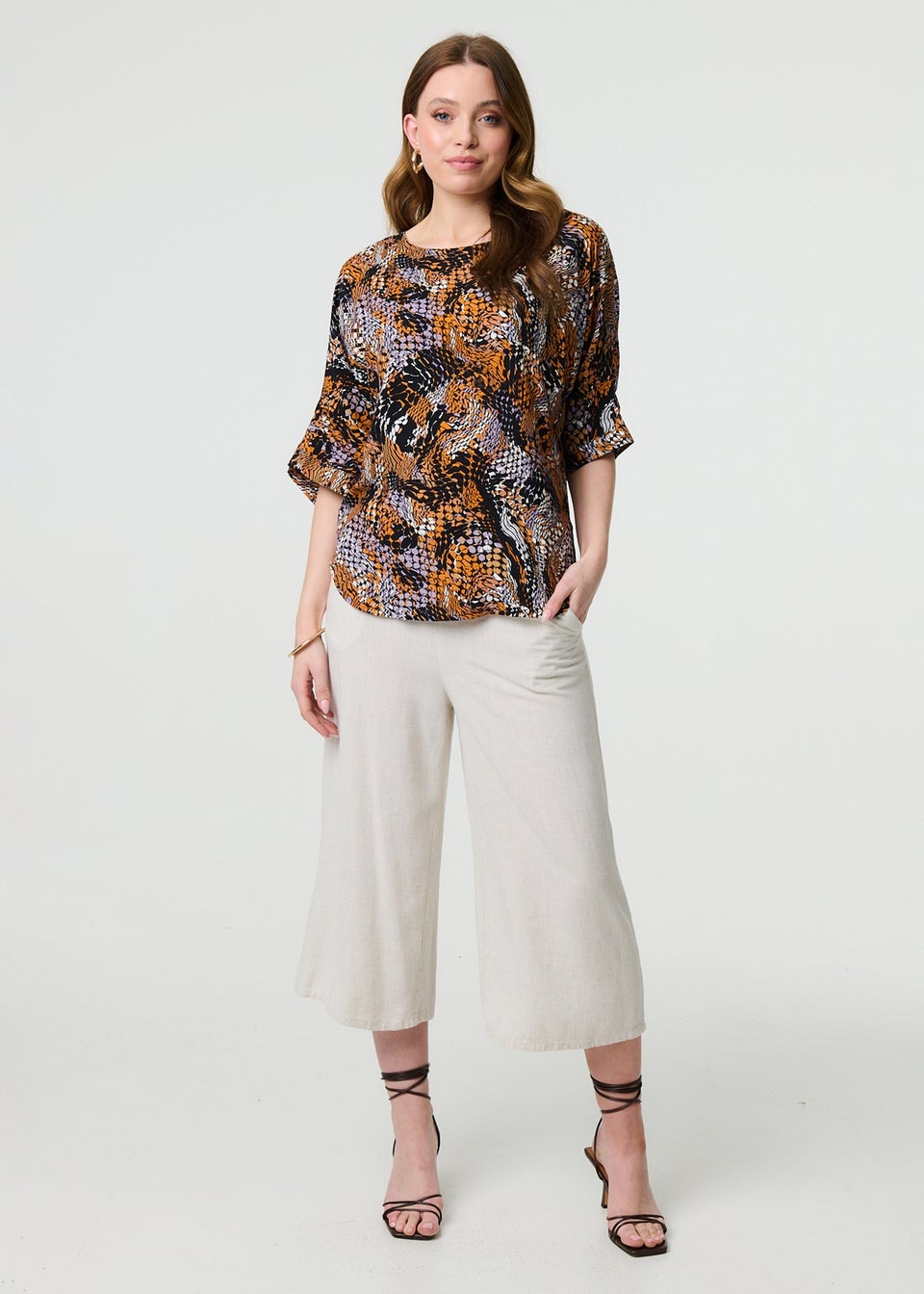 Izabel London Black Animal Print 3/4 Sleeve Relaxed Top