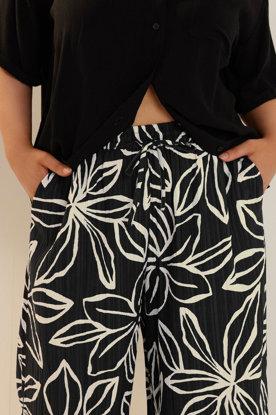 Yours Curve Black & White Floral Print Textured Wide Leg Trousers