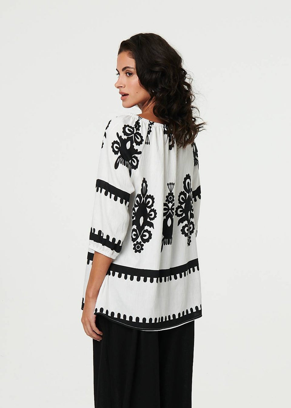 Izabel London White Ikat Print Tassel Tie Neck Blouse