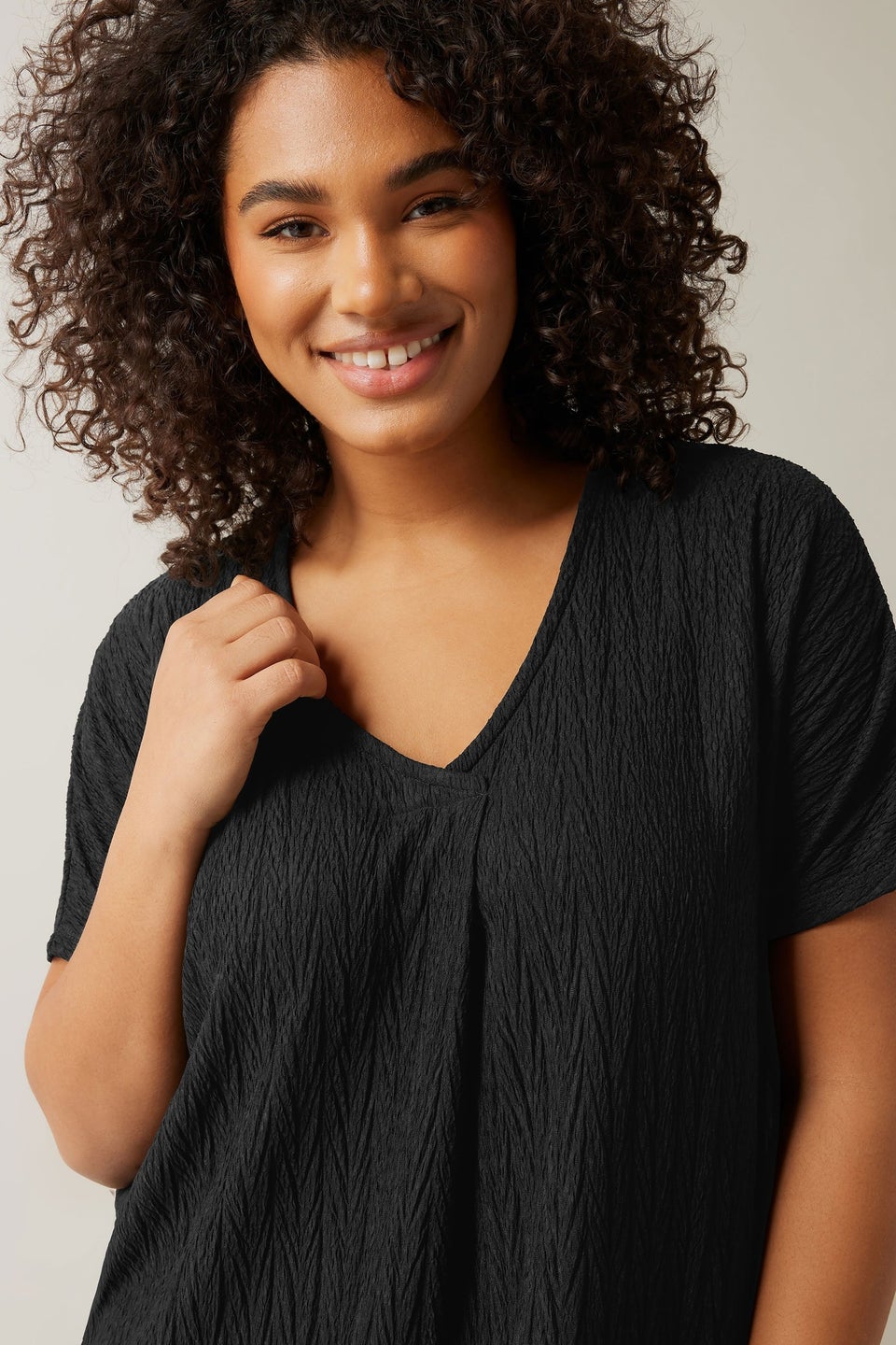 Evans Curve Black Plisse Pleat Front Top