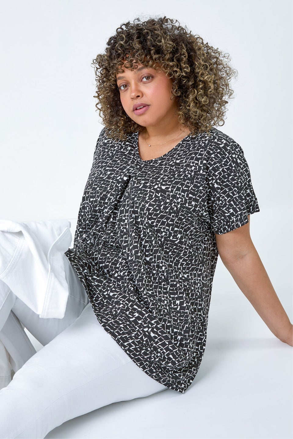 Roman Black Curve Pleat Front Printed V-Neck Stretch Top