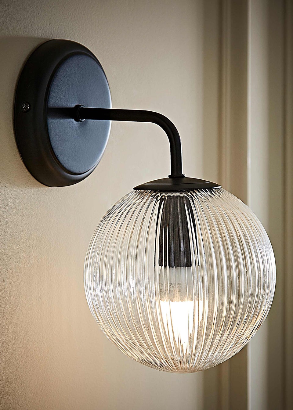 ValueLights Kempton Matte Black Wall Light with Ribbed Globe Shade