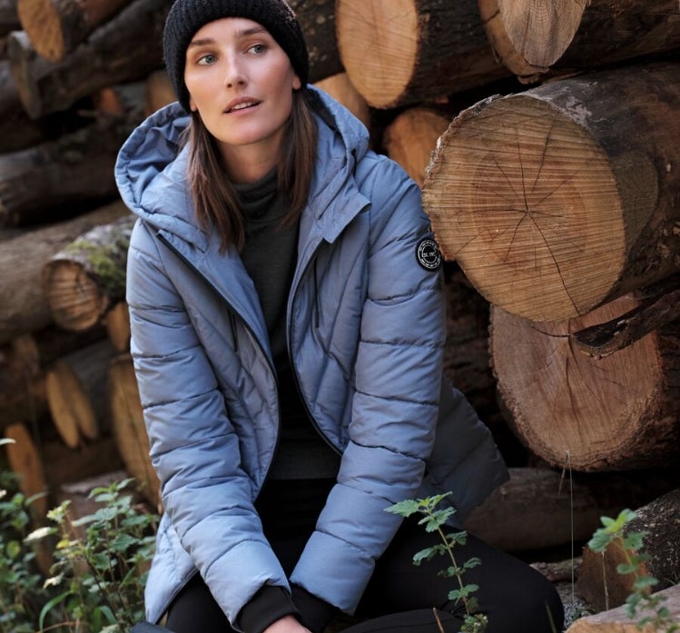 woman in waterproof jacket and beanie for winter wonderland