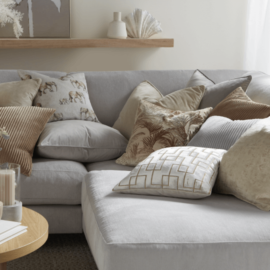 Grey sofa with outlet coloured cushions