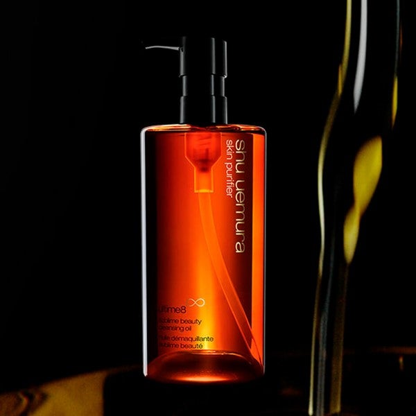 shu uemura cleansing oil in black background